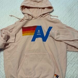 Aviator Nation Pink Hoodie with Blue Logo and Rainbow Stripe
